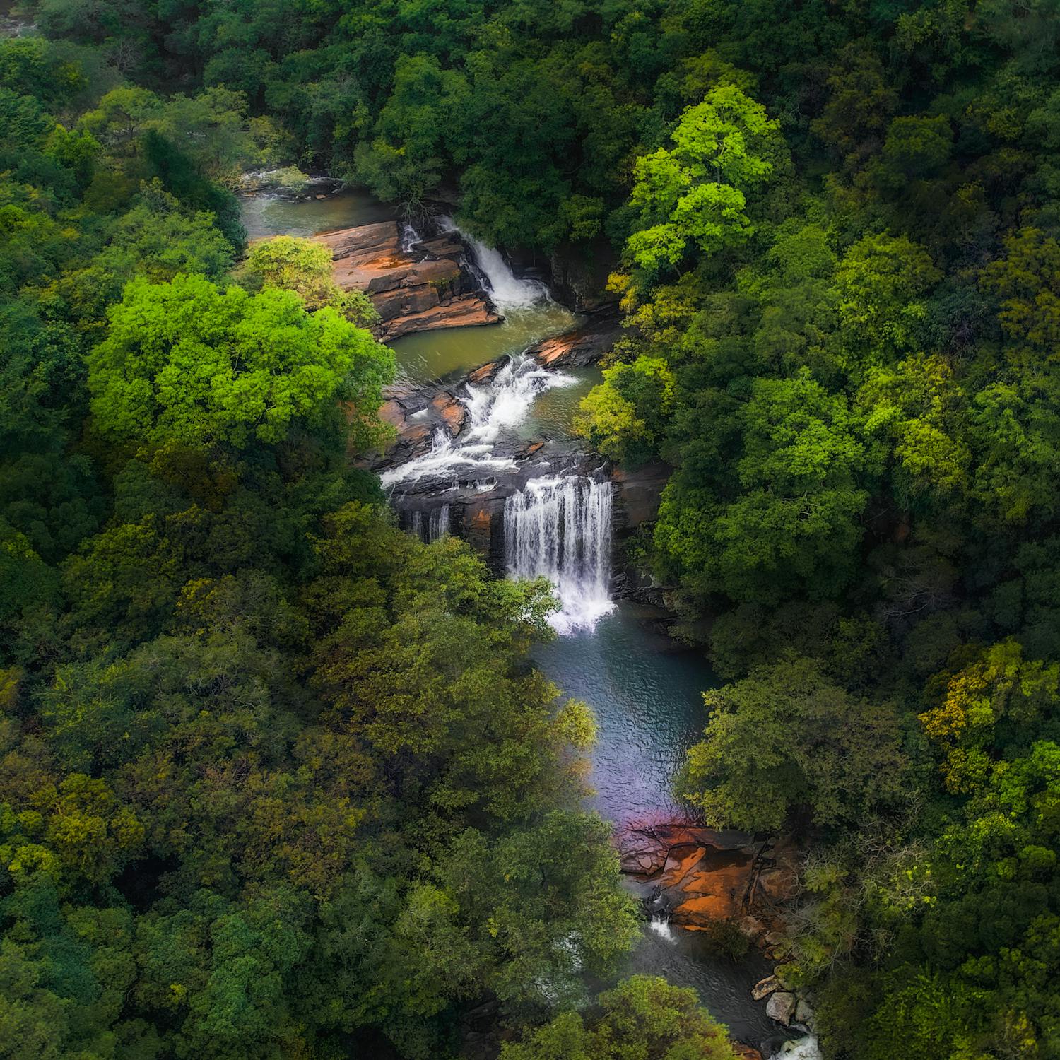free-photo-of-waterfall-breaks-on-river-in-forest.jpeg